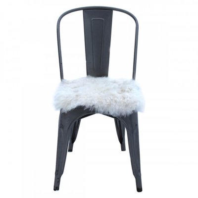 Hvitt sitteunderlag saueskinn